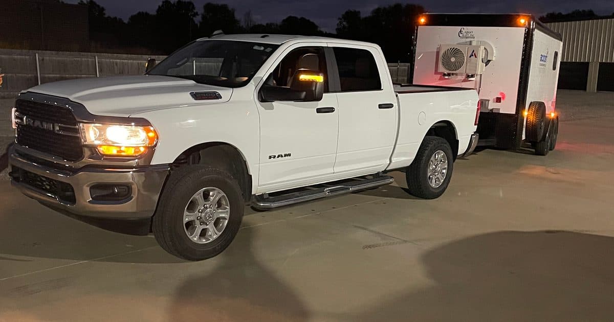 Boost mobile nanobubble service trailer connected to a working pumpjack on a stripper well
